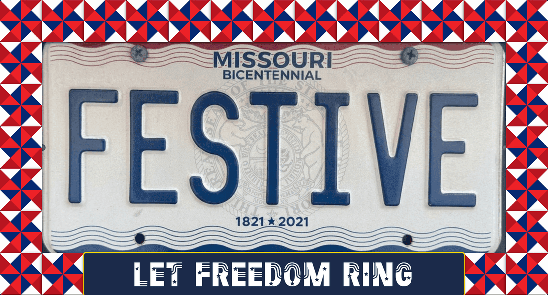 Red, white and blue Festive Frames license plate frame with pinwheel tiles and a LET FREEDOM RING bottom bar